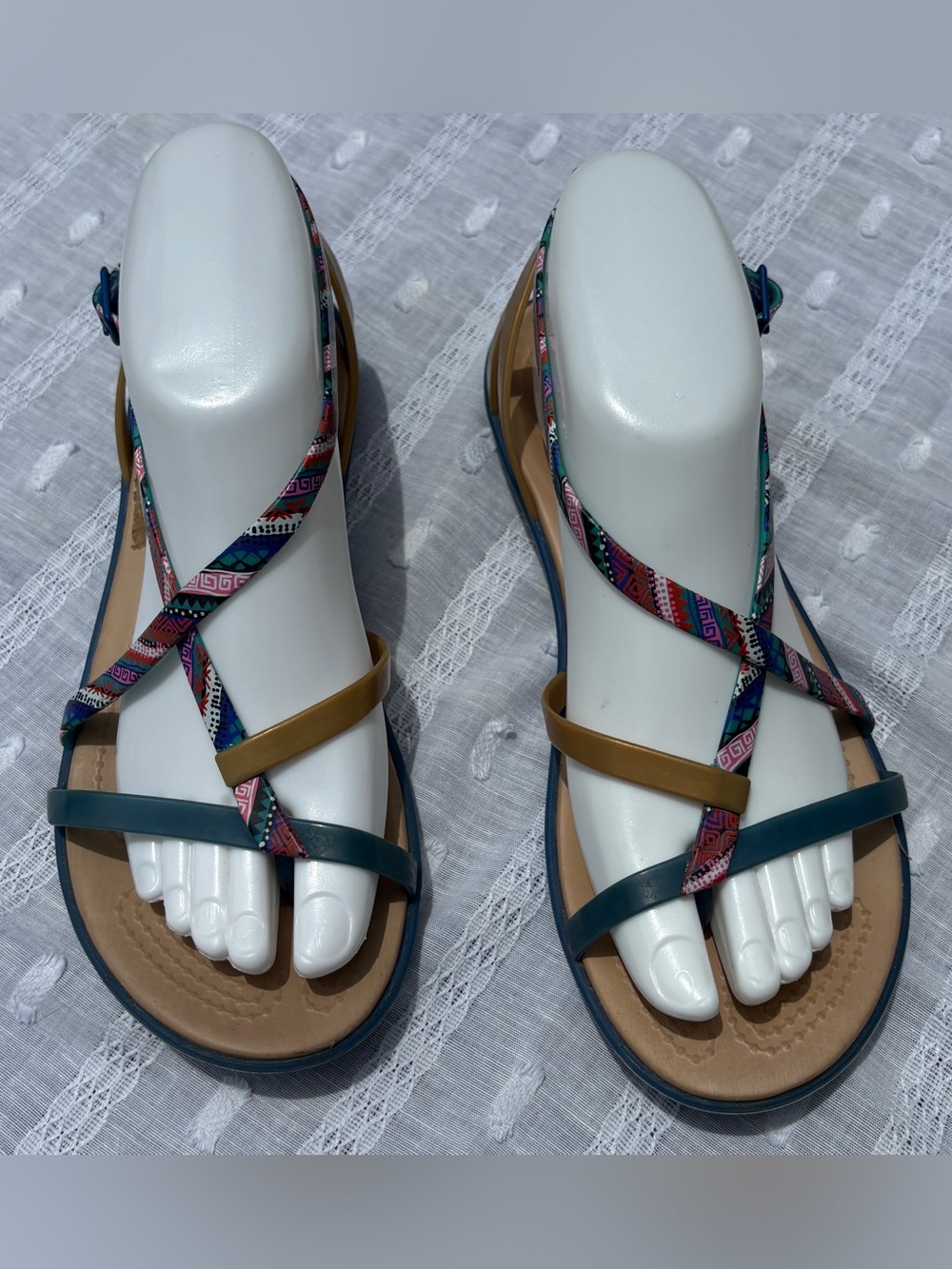Crocs Women's Isabella Gladiator Graphic Sandals in the "Blue Jean/Gold" color 7